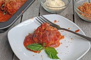 Chicken parmesan is reimagined as a saucy, one-pan meatball dish with a crunchy panko topping. (Gretchen McKay/Pittsburgh Post-Gazette/TNS)
