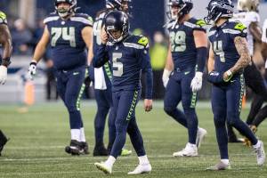 Seattle Seahawks kicker Jason Myers (5) walks off the field after missing a field goal during the second half of an NFL football game against the New Orleans Saints, Monday, Oct. 25, 2021, in Seattle. The Saints won 13-10. (AP Photo/Stephen Brashear)