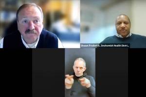 Snohomish County Executive Dave Somers (top left) and Snohomish County Health District Administrative Officer Shawn Frederick (top right) give a COVID-19 update Tuesday in Everett. (Snohomish County Health District)