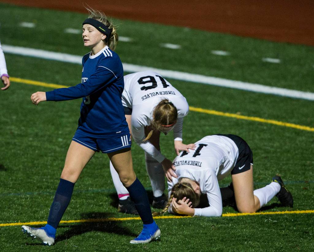 Glacier Peaks Chloe Seelhoff walks away from Jacksons Haley McCoy after fouling her during the game Tuesday in Snohomish. (Olivia Vanni / The Herald)