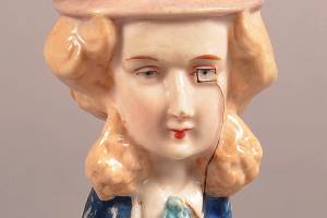 This fanciful bisque match holder made to look like a man sold for $59 at Conestoga Auction. A recognizable caricature of a known person would have a higher value. (Cowles Syndicate Inc.)