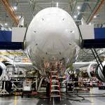 Employees work on a Boeing 787 Dreamliner during final assembly of the airplane at the Boeing factory in Everett on May 28, 2013. (Patrick T. Fallon/Bloomberg, file)