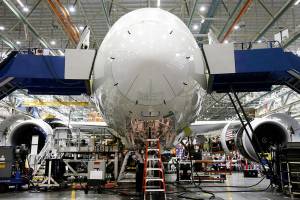 Employees work on a Boeing 787 Dreamliner during final assembly of the airplane at the Boeing Co. factory in Everett, Wash., on May 28, 2013. MUST CREDIT: Bloomberg photo by Patrick T. Fallon.
