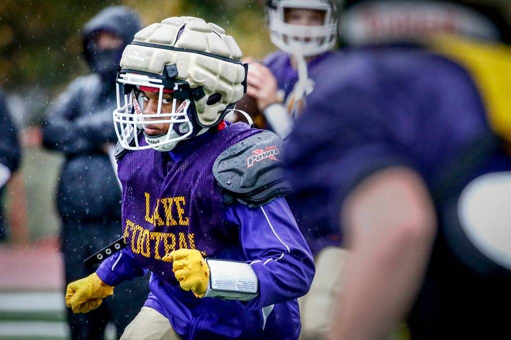 Trayce Hanks runs a route during practice Thursday evening at Lake Stevens on October 28, 2021. (Kevin Clark / The Herald)