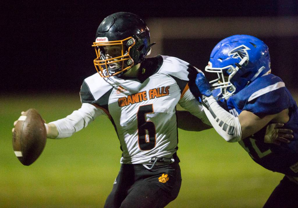 Granite Falls Riley Hoople is tackled during the game against South Whidbey on Friday, Oct. 29, 2021 in Langley, Wa. (Olivia Vanni / The Herald)