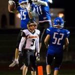 South Whidbeys Lucas Taksony and Prince Browne celebrate a touchdown during the game against Granite Falls on Friday, Oct. 29, 2021 in Langley, Wa. (Olivia Vanni / The Herald)