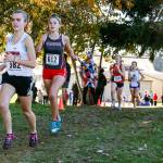 Snohomishs Paige Gerrard, left, and Stanwoods Leia Jones leads the pack Saturday afternoon during the 3A District 1 Cross Country Championships at Lakewood High School in Arlington on October 30, 2021. (Kevin Clark / The Herald)