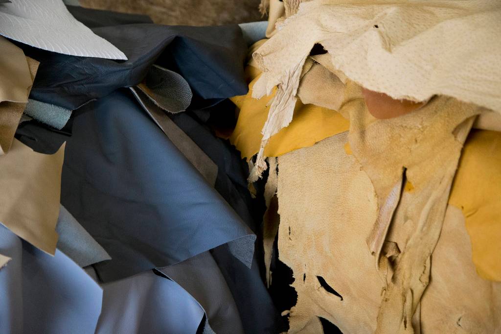Scrap leather pieces for sale at Quil Ceda Leather in Marysville. (Andy Bronson / The Herald)