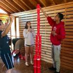 Facilitating Team Solutions has organized team building programs in large, indoor spaces for clients like Amazon and Boeing, and also works with sports teams and small businesses in school fields and boardrooms.