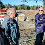 Members of Livable Lake Stevens  Charles Allen (left), David Clay (center) and Doug Turner  meet at the construction site of Costco in Lake Stevens on Sunday. (Kevin Clark / The Herald)