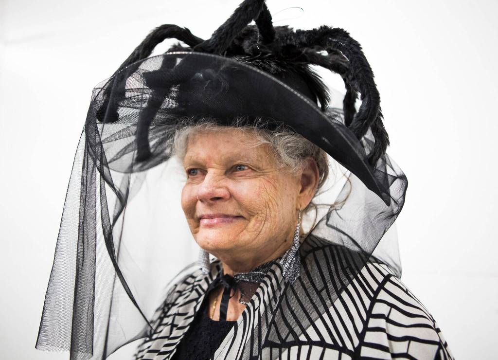 Catherine Justice, dressed in a spider-themed outfit, poses for a portrait at the last Oddmall Emporium of the Weird in 2019 in Monroe. (Olivia Vanni / Herald file)