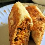 A flour tortilla stuffed with chorizo sausage, scrambled eggs, crispy potatoes and Mexican cheese makes the perfect breakfast-on-the-go. (Gretchen McKay/Pittsburgh Post-Gazette/TNS)