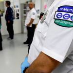 FILE - In this June 21, 2017, file photo, a guard with the GEO Group stands in a detainee processing section of the Northwest Detention Center in Tacoma, Wash., during a media tour of the facility.  The Trump administration is opposing Washington state’s effort to make a privately run, for-profit immigration jail pay detainees minimum wage for the work they do.
Washington Attorney General Bob Ferguson sued The GEO Group in 2017, saying its Northwest Detention Center in Tacoma must pay the state minimum wage to detainees who perform kitchen, janitorial and other tasks. (AP Photo/Ted S. Warren, File)