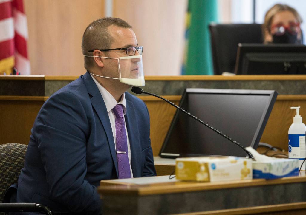 Everett police detective Alexander Helphrey testifies during the trial of Frank Walton on Thursday in Everett. (Olivia Vanni / The Herald)