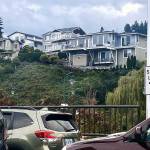 Hillside homes in Mukilteo are seen from the ferry line on Oct. 20. (Andrea Brown / The Herald)