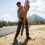 Mike Remle helps install posts at the new Whitehorse Campground in Darrington. (Olivia Vanni / The Herald)