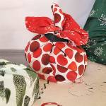 Green your holiday present-wrapping process by choosing reusable fabric and recyclable paper. (Jennifer Bardsley)