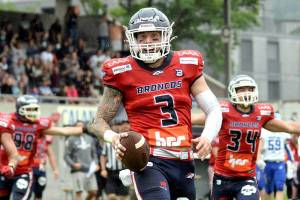 Max Gray of Arlington runs with the ball during a game with the Calanda Broncos. (Sergio Brunetti / Stockpix.it)