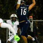 Glacier Peaks Torey Watkins makes a touchdown reception with Skylines JT Weir defending Friday night at Veterans Memorial Stadium in Snohomish on November 5, 2021. (Kevin Clark / The Herald)