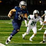 Glacier Peaks River Lien strides the sideline against Skylines defense Friday night at Veterans Memorial Stadium in Snohomish on November 5, 2021. (Kevin Clark / The Herald)