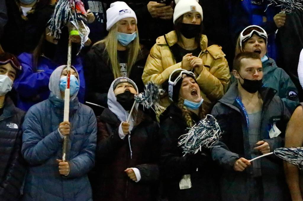 Glacier Peaks fans cheer the action of the field Friday night at Veterans Memorial Stadium in Snohomish on November 5, 2021. (Kevin Clark / The Herald)