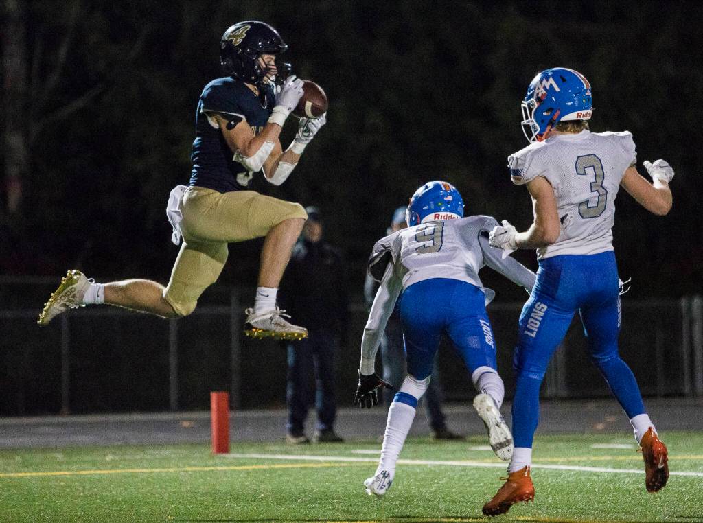Arlingtons Gage Price catches the ball in the end zone for a touchdown during the game against Auburn Mountainview on Friday, Nov. 5, 2021 in Arlington, Wa. (Olivia Vanni / The Herald)