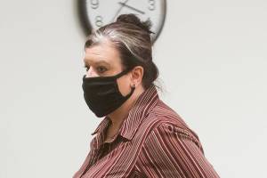 Alexis Wafstet, 45, walks out of court, after admittiong guilt to introducing contraband in the second degree ,at the Snohomish County Courthouse on Tuesday, Oct. 5, 2021 in Everett, Washington. Wafstet pleaded guilty for smuggling narcotics into the jail according to her employer, the Snohomish County Sheriff’s Office. (Andy Bronson / The Herald)