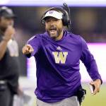 FILE - Washington head coach Jimmy Lake yells toward the field in the first half of an NCAA college football game against California, Saturday, Sept. 25, 2021, in Seattle. Washington on Monday, Nov. 8 suspended head coach Jimmy Lake for one game without pay following a sideline incident during the Huskies' game against Oregon.  (AP Photo/Elaine Thompson, File)