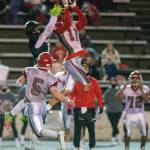Stanwood defensive back Isaiah Hughes (11) intercepts a pass intended for Lincolns Ace Falenofoa late in the fourth quarter of a 3A winner-to-state playoff game on Nov. 5 at the Lincoln Bowl in Tacoma. (Pete Caster / The News Tribune)