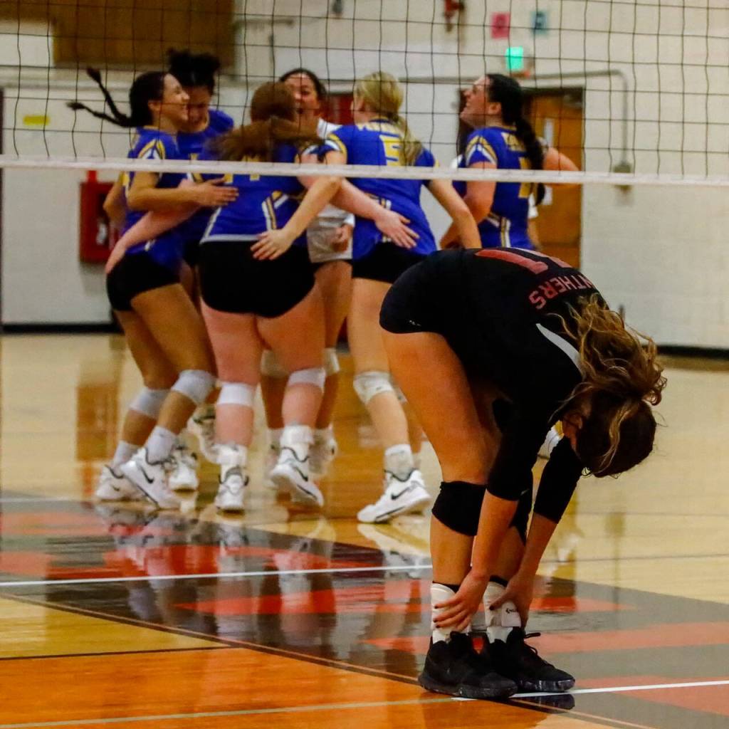 Snohomishs Liviya Harrison is left dejected after loosing to Ferndale in straight sets Thursday evening during the 3A District volleyball playoffs at Marysville Pilchuck High School on November 11, 2021. (Kevin Clark / The Herald)