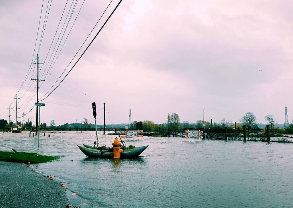 Lincoln Avenue in Snohomish was closed where it intersects with First Avenue due to flooding Monday. (Ellen Dennis / The Herald)