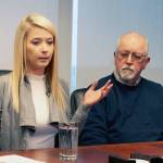 Britt Jakobsen (left) speaks to reporters in Seattle on Nov. 21, 2018. She was in the passenger seat when her boyfriend, Nickolas Peters, was shot by a Snohomish County sheriffs deputy. At right is her father, Ken Jakobsen. (Zachariah Bryan / Herald file)
