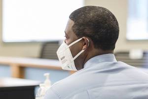 Frank Walton sits with his attorney before the start of his trial on Thursday, Nov. 4, 2021 in Everett, Wa. (Olivia Vanni / The Herald)