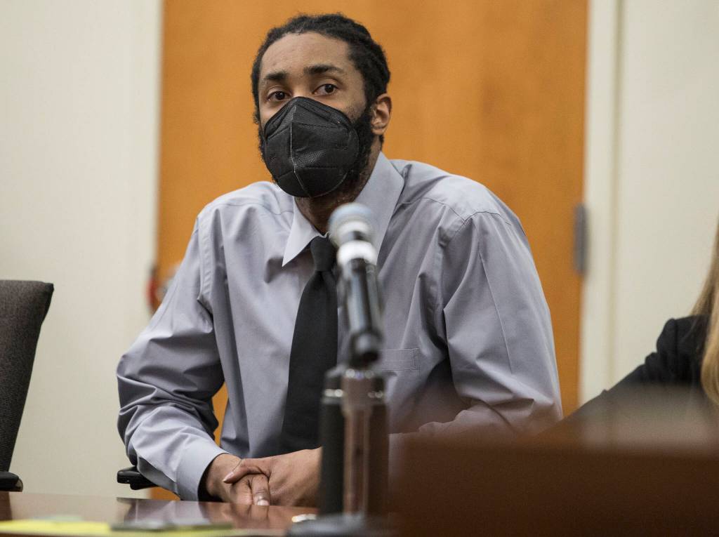 Defendant Kevin Lewis listens while Snohomish County Superior Court Judge Paul Thompson reads the guilty verdict Thursday in Everett. (Olivia Vanni / The Herald)