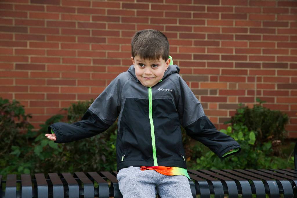 Andrew, 6½, reacts to a question about Thanksgiving outside Mount Pilchuck Elementary on Monday in Lake Stevens. (Andy Bronson / The Herald)