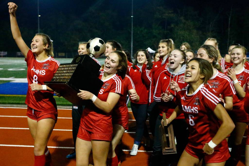 Archbishop Murphy celebrates winning the 2A state championship at Shoreline Stadium on November 20, 2021. The Wildcats won 2-0. (Kevin Clark / The Herald)