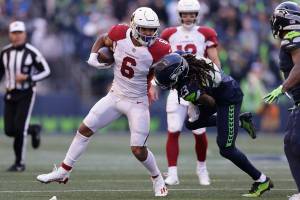 Arizona Cardinals running back James Conner (6) carries against the Seattle Seahawks during the first half of an NFL football game, Sunday, Nov. 21, 2021, in Seattle. (AP Photo/John Froschauer)