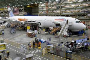 FILE - In this June 12, 2017, file photo, a Boeing 787 airplane being built for Norwegian Air Shuttle is shown at Boeing Co.'s assembly facility, in Everett, Wash. Boeing is dealing with a new production problem involving its 787 jet, in which inspections have found flaws in the way that sections of the rear of the plane were joined together. Boeing said Tuesday, Sept. 8, 2020, it's not an immediate safety risk but could cause the planes to age prematurely. (AP Photo/Ted S. Warren, File)