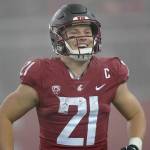 Washington State wide running back Max Borghi (21) reacts late in the second half of an NCAA college football game against Arizona, Friday, Nov. 19, 2021, in Pullman, Wash. Washington State won 44-18. (AP Photo/Ted S. Warren)