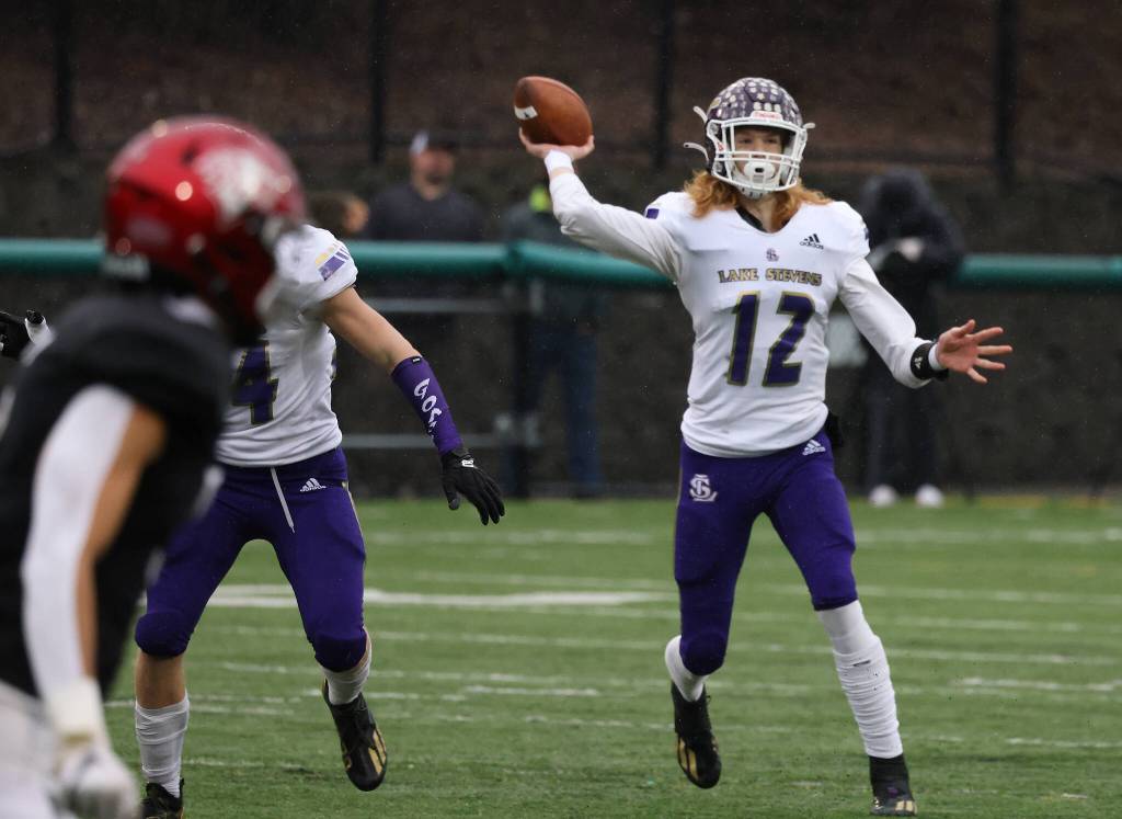 Lake Stevens quarterback Grayon Murren makes a pass during a 4A state semifinal game against Eastlake on Saturday at Pop Keeney Stadium in Bothell. (Andy Bronson / The Herald)