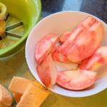 Bill Howell, a plant pathologist from Prosser, created the Lucy Rose apple variety as a cross between the Honeycrisp and an Airlie Red variety. They are notable for their red centers.(Jennifer Bardsley)