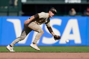 Padres second baseman Adam Frazier field the ball during a baseball game against the Giants on Sept. 16, 2021, in San Francisco. The Mariners acquired the All-Star second baseman from the Padres in exchange for two minor-leaguers on Saturday. (AP Photo/Jeff Chiu)