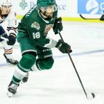 Everett Silvertips Hunter Campbell (18) controls the puck during a game against Kamloops on Saturday at Angel of the Winds Arena in Everett. (Kristin Ostrowski/Everett Silvertips)