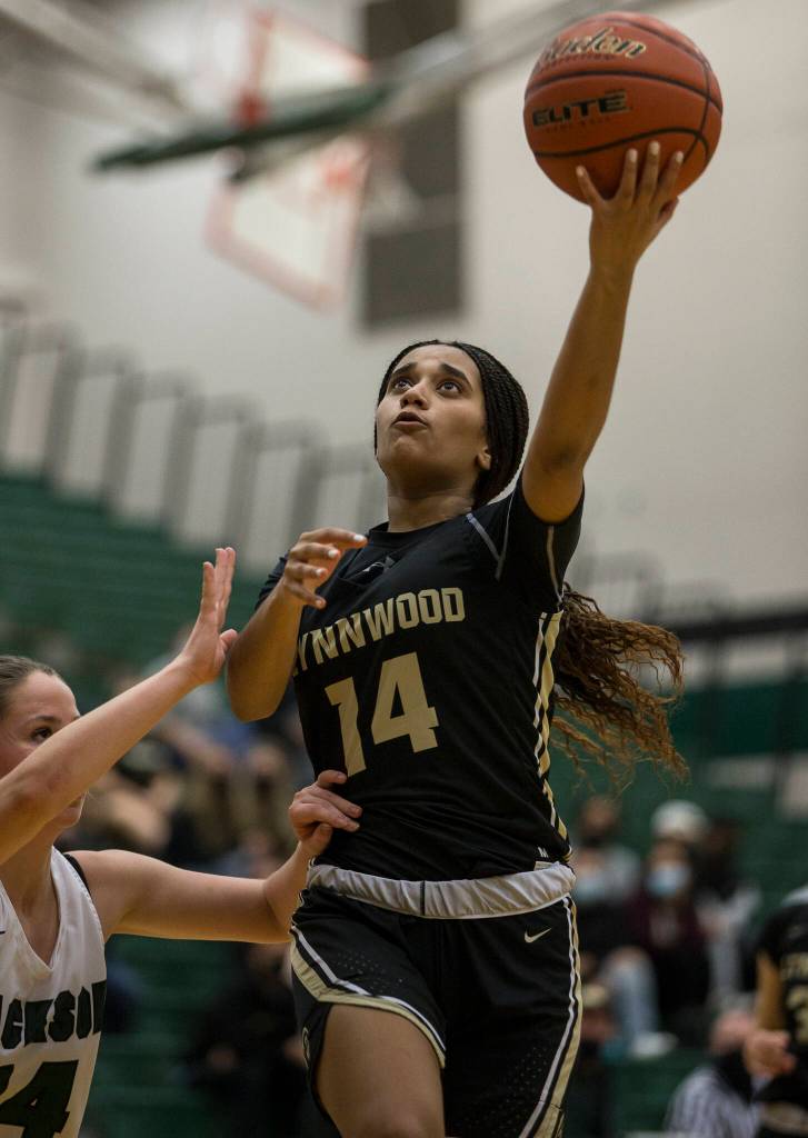 A Lynnwood player attempts a layup during the game against Jackson on Tuesday in Everett. (Olivia Vanni / The Herald)