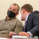 Jeremy Pidgeon (left) confers with his defense attorney John Garza during his sentencing at Snohomish County District Court in Monroe on June 23. (Kevin Clark / The Herald)