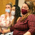 From left: Allison Smith, Jamie Gonzales and Jodie Aney listen during the sentencing of Jeremy Pidgeon in Snohomish County District Court in Monroe on June 23. (Kevin Clark / The Herald)