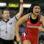 Snohomishs Joessie Gonzales is overcome with emotion after winning the 130-pound championship at the 30th Annual Mat Classic in Tacoma on Feb. 17, 2018. (Kevin Clark / Herald file)