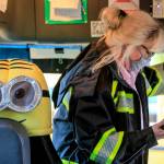 Kelly Brookbank, a former resident of Whispering Pines, performs a pre-drive check on a school bus in Seattle. (Kevin Clark / The Herald)