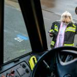 Kelly Brookbank, a former resident of Whispering Pines, performs a pre-drive check on a school bus in Seattle. She said staff at the apartment complex became less responsive to tenants maintenance requests and increasingly hostile as a moving deadline approached. (Kevin Clark / The Herald)