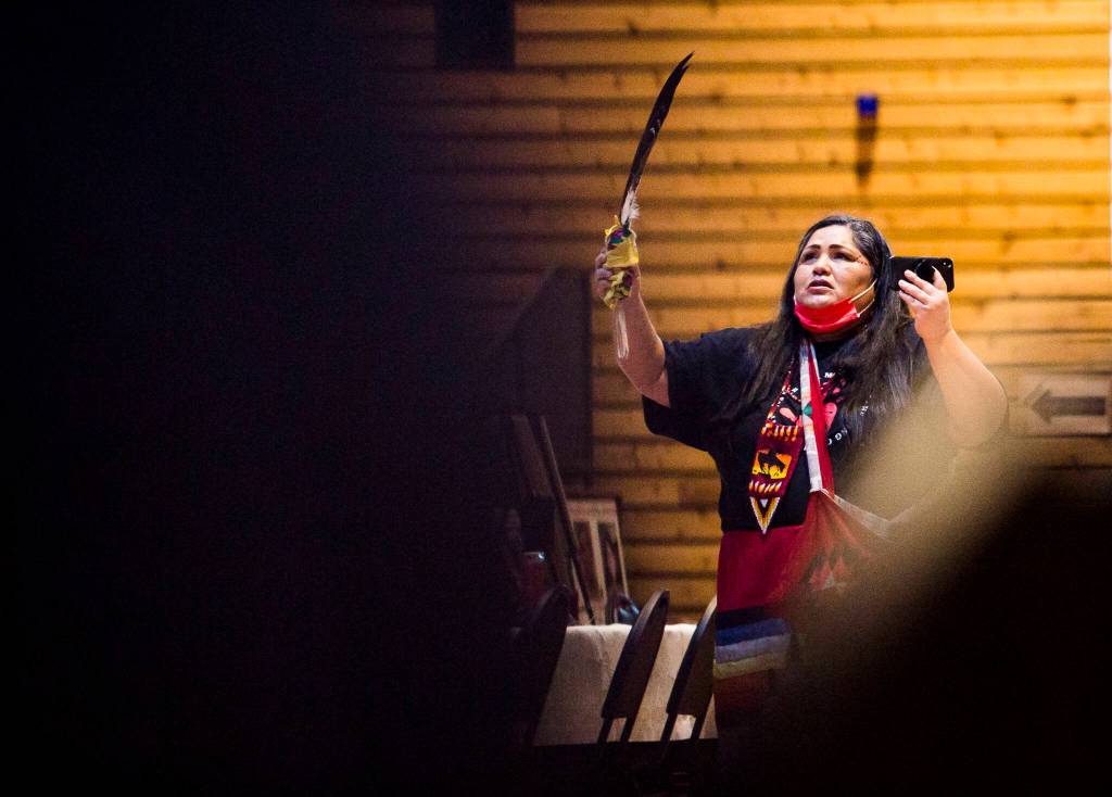 Roxanne White, founder of an organization called Missing and Murdered Indigenous People & Families, sings during a gathering in support of the continued search for Mary Ellen Johnson-Davison in Tulalip on Thursday. (Olivia Vanni / The Herald)